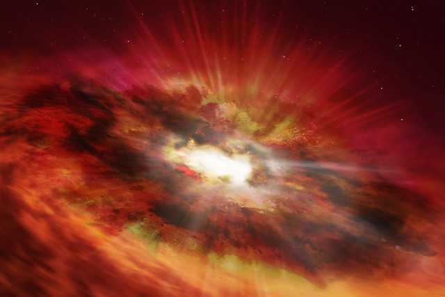 スターバースト銀河の中心部で誕生した超大質量ブラックホールのイラスト
