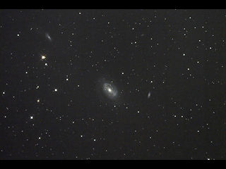 （NGC 4725の写真）