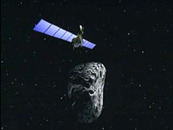 小惑星に接近する彗星探査機ロゼッタの想像図